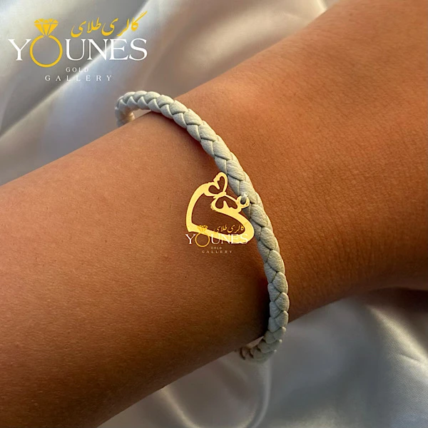 دستبند چرم طوسی شاپرک قلبی طلا